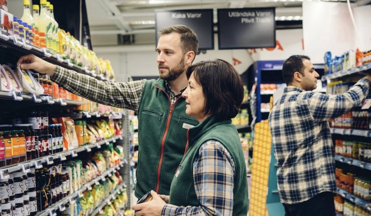 Store employees reviewing shelf conditions